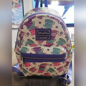 RARE Disney Alice in Wonderland Mad Tea Party Loungefly Backpack cream/purple
